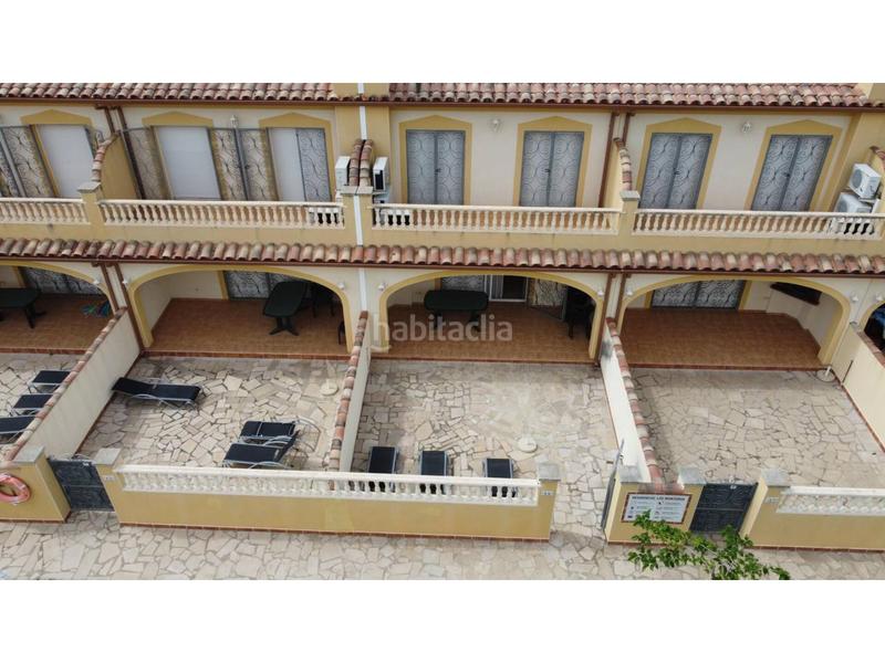 Foto 4a7d76a1-5630-40a4-8b8f-af81832a8ba5. Reihenhaus mit parking pool in Passeig Marítim Miami Platja