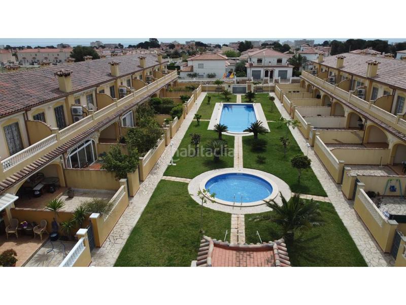 Foto 52411b17-2aa6-4f13-a4a0-e6fe6b9d3eea. Reihenhaus mit parking pool in Passeig Marítim Miami Platja