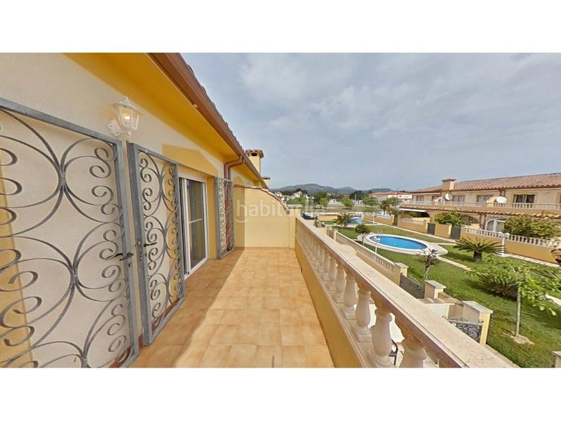 Foto 6f7a646f-d730-40f6-b327-a8e208e5be47. Reihenhaus mit parking pool in Passeig Marítim Miami Platja