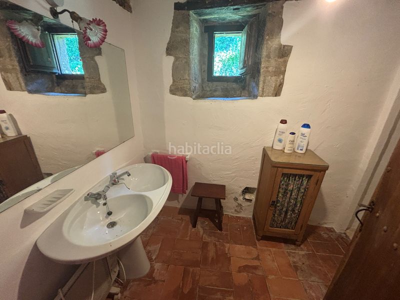 Foto b92ad765-7878-44ea-8e08-09e83c94369a. Masia amb xemeneia calefacció a Olot