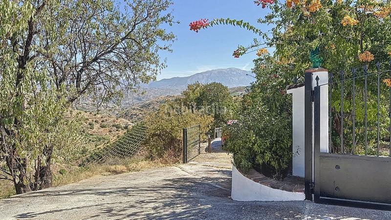 Foto a98031cb-3177-4eff-8966-87d389ee6506. Bauernhof mit parking pool in Almáchar