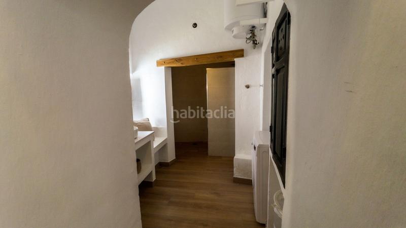 Foto 2165b3b8-f509-4dbd-8a04-f0b6e32bc088. Casa adossada a Guaro