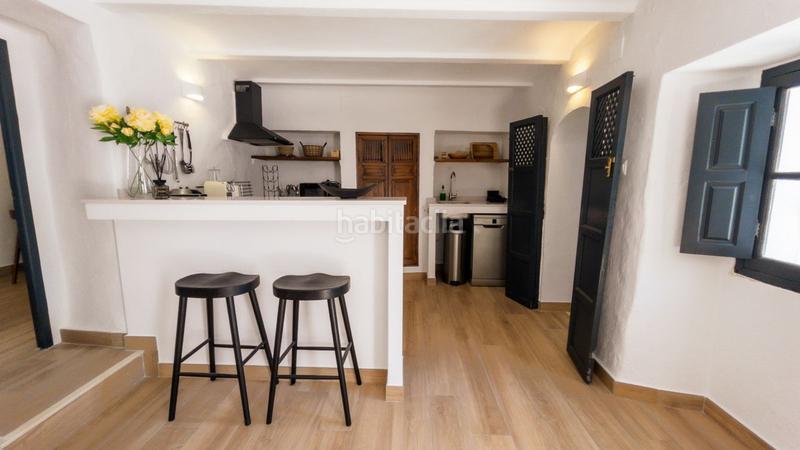 Foto edff104f-cd3f-4371-bb3b-74cb8f7c2ee9. Casa adossada a Guaro