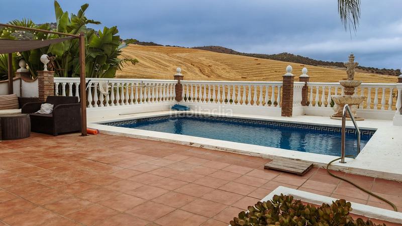 Foto 3c818390-6e43-469b-8f14-6625472a9e5a. Bauernhof mit parking pool in Almogía