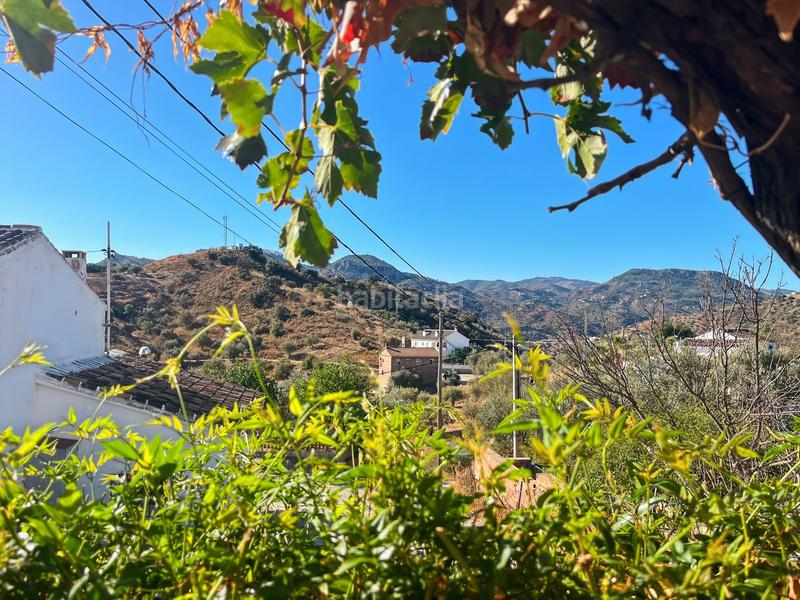 Foto e859e09d-5ed7-43d1-8019-a91b2b8620f1. Reihenhaus mit parking in Cútar