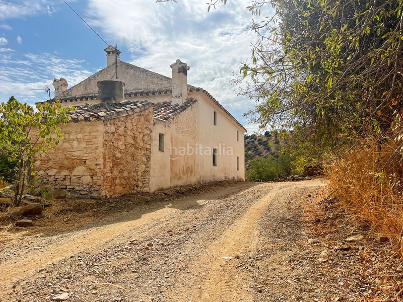 Foto 65c1e164-c86c-4fbc-ab81-a8ada5c6464c. Masia amb aparcament a Olías Málaga