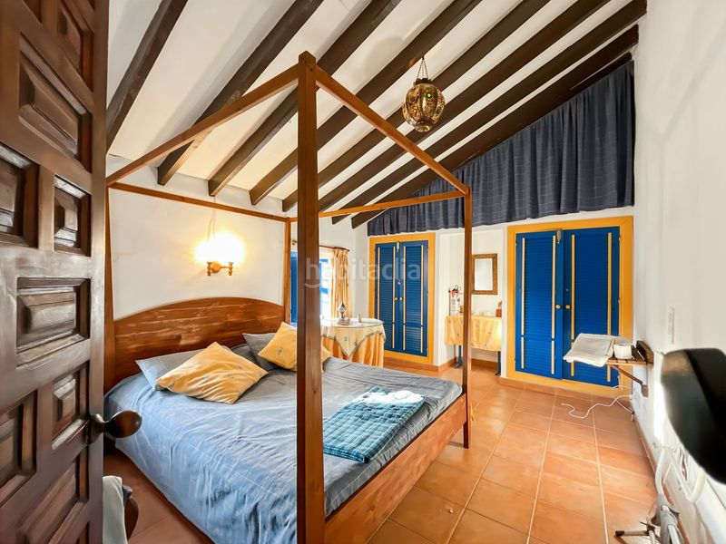 Foto fa7f6129-e724-44ee-84b9-2b45899416b8. Casa adossada amb aparcament a Comares