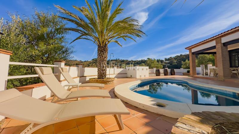 Foto d6c03d04-87d0-49ce-9f56-0425d978ed98. Masia amb aparcament piscina a Olías Málaga