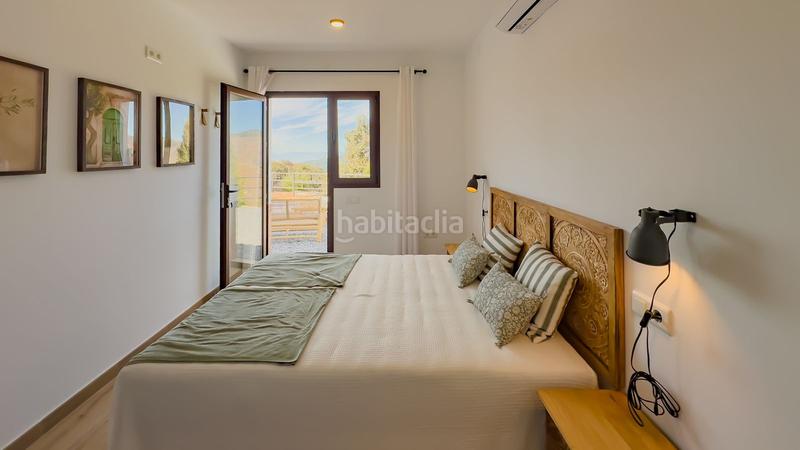 Foto dbf00beb-e781-4236-8552-4bccfa666c89. Masia amb aparcament piscina a Olías Málaga