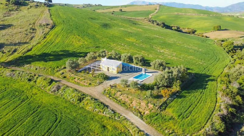 Foto 596cd89d-6bd5-4f50-bbf5-9c119ca46757. Masia amb aparcament piscina a Coín