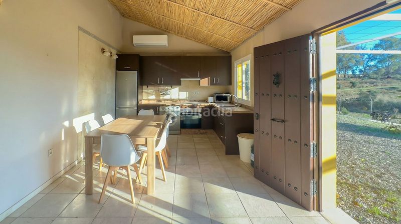 Foto c051cb7e-5033-47aa-a6a6-136af22a83a4. Masia amb aparcament piscina a Coín