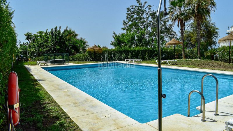 Foto c5812342-ec99-4b0b-8cd8-80d3aec73eb6. Casa adossada amb aparcament piscina a Miraflores del Palo Málaga