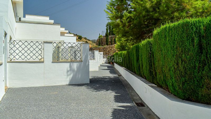 Foto dead5af9-e6b7-4a3f-93c4-6c4a2d49f732. Casa adossada amb aparcament piscina a Miraflores del Palo Málaga