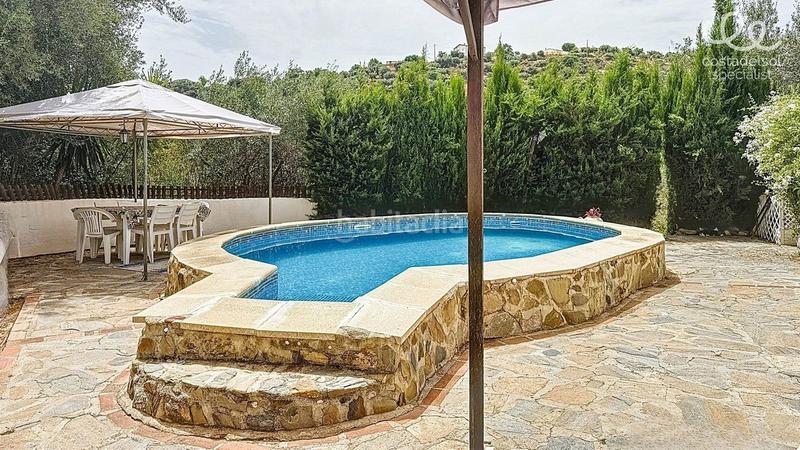 Foto b67a6df4-0590-4b8a-850e-319858c6a65c. Masia amb aparcament piscina a Comares