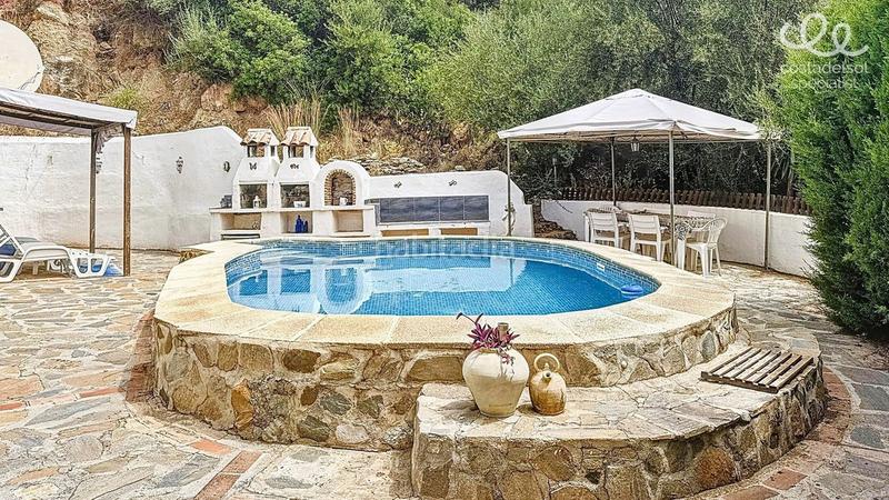 Foto d2b88219-b527-401c-8c6d-0d4daf5edae4. Masia amb aparcament piscina a Comares