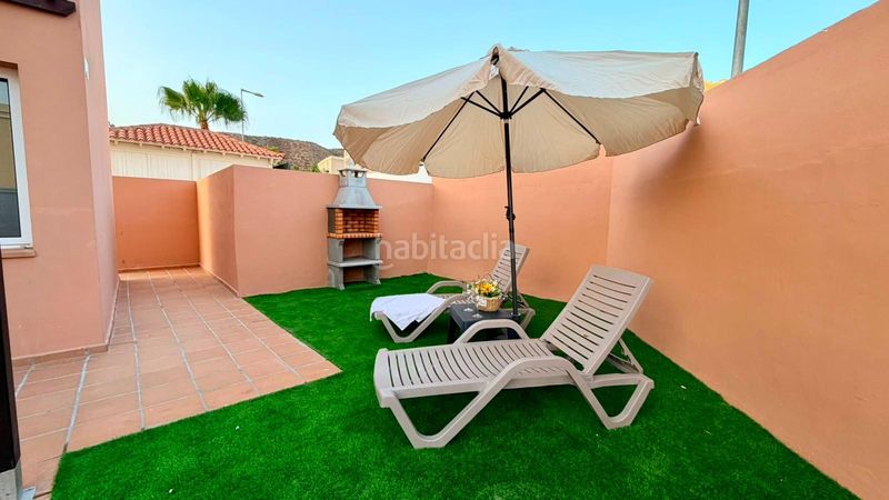 Foto f3d344dc-5fe7-48a1-8e53-44933ab35f41. Casa adossada amb aparcament piscina a Palm - Mar Arona