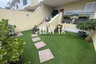 Casa adossada a Calle el peralillo 3. Chalet adosado en oasis fañabé cuatro dormitorios