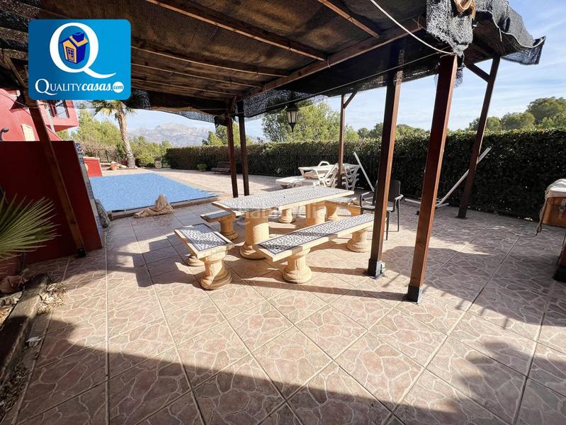 Foto c34c8b68-476e-48be-987b-ec54c85cc07e. Chalet  en venta en nucia la, 4 dormitorios. en Nucia (la)