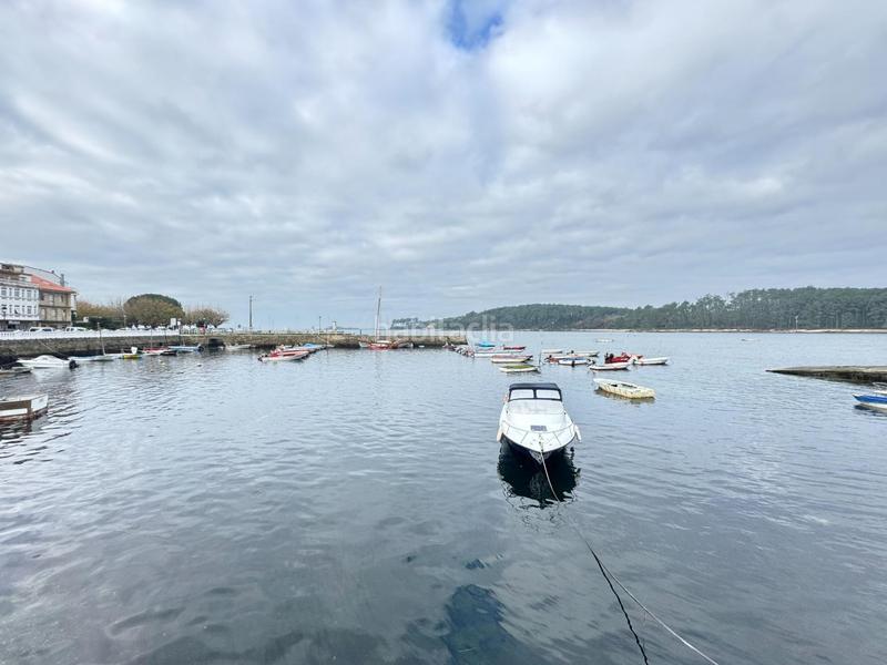 Foto c0231282-52ed-4b21-9fbd-58ac3cc77da6. Semi detached house with heating in O Carril Vilagarcía de Arousa