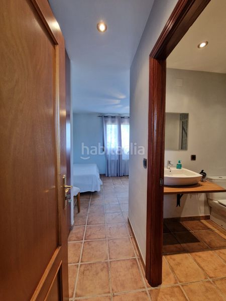 Foto 2f14cbb5-9880-437c-81da-10f55a774c04. Masia amb xemeneia calefacció aparcament piscina a Preixens