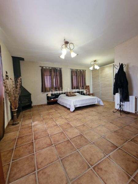 Foto b6223bfc-0aa7-4dff-8995-4c14fd99ca93. Masia amb xemeneia calefacció aparcament piscina a Preixens