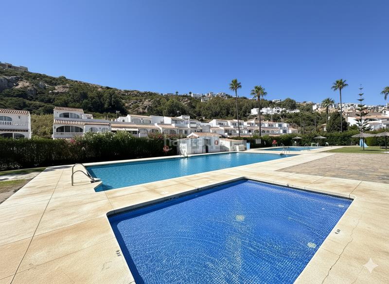 Foto 02aeb3c9-9f31-4cba-ba58-a51c4854ca89. Towny house with parking pool in Chullera Manilva