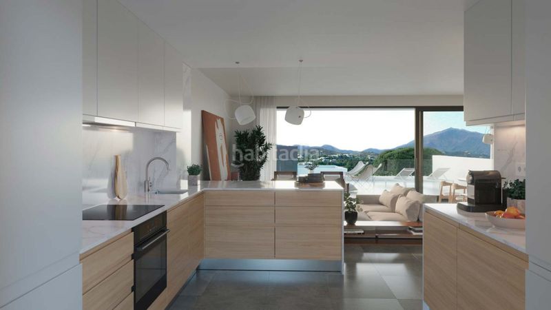 Foto e90c8f0f-4876-4abf-86de-2d9bdc9b2f00. Casa aparellada amb aparcament piscina a Nueva Atalaya Estepona