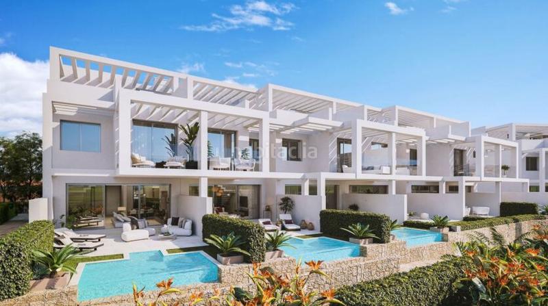 Foto 82982266-7c23-4614-96d3-3bf84a4abbd0. Casa adosada adosado llave en mano con solárium y vistas al mar en Manilva