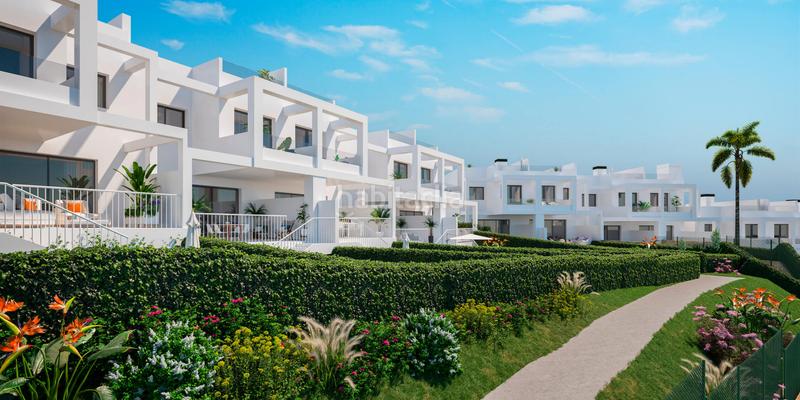 Foto e1f8f188-4525-49d7-b23b-ae88ccc479e0. Casa adosada adosado llave en mano con solárium y vistas al mar en Manilva