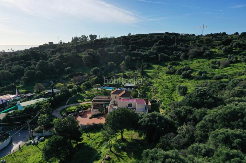 Foto 6687f5bf-e383-4033-b134-b4dc76fc0546. Casa con parcheggio piscina in Guadalobón Estepona