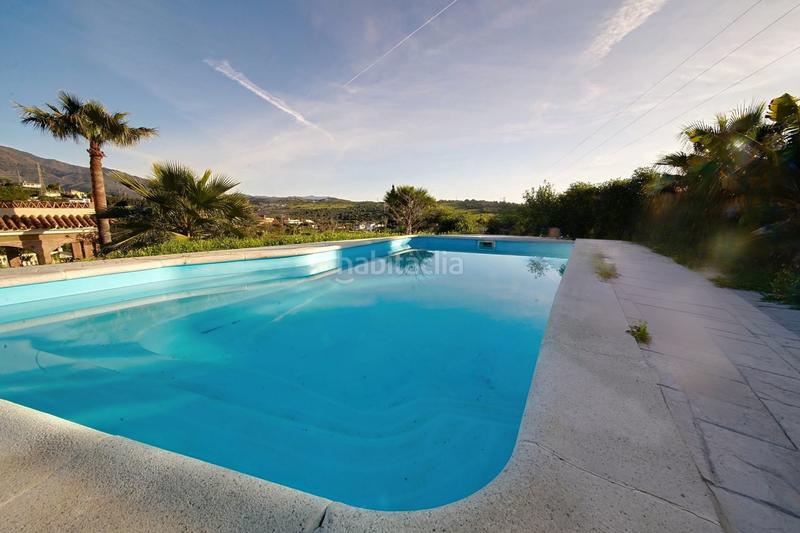 Foto c78279ba-f3be-4d3f-a0df-e2f7c4bb1fa6. Casa con parcheggio piscina in Guadalobón Estepona