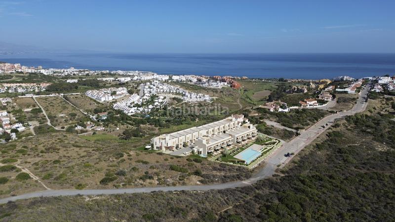 Foto 5d9a0f4d-99a0-487f-a018-17a8382c7118. Semi detached house with parking pool in Alcorrín Manilva