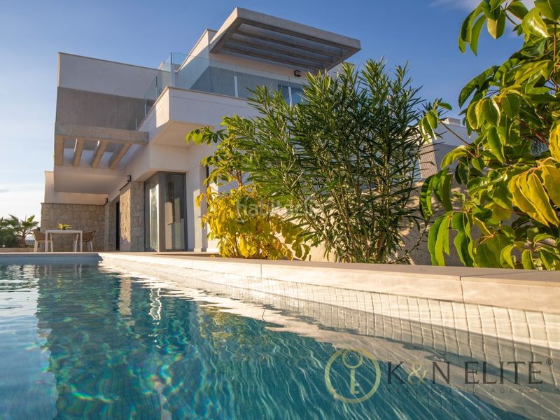 Foto f7f8c4c3-13fe-4e69-8597-ece54ce287b4. Casa amb aparcament piscina a Golf Bahía Finestrat