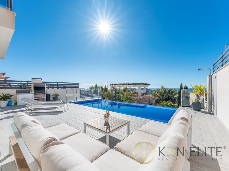 Foto 12bf5b28-6567-4e59-82a6-a6a7a1a222df. House with parking pool in balcón de Finestrat-terra marina Finestrat