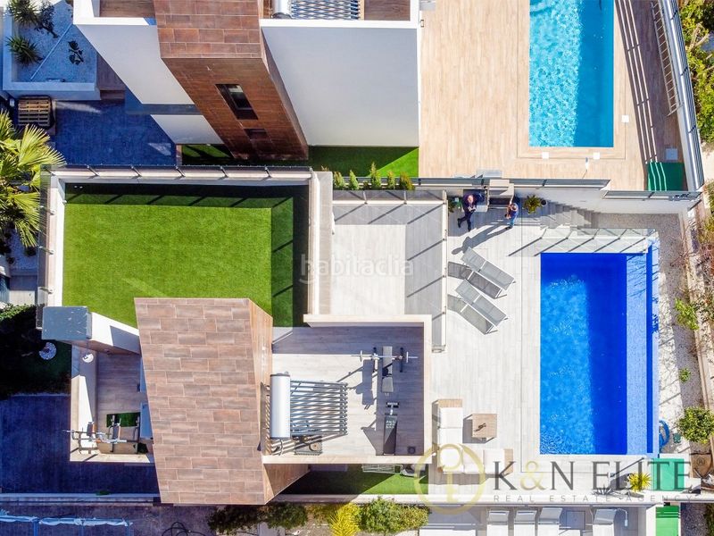 Foto c3a91172-d05a-46aa-9ce8-81f4ca697b40. House with parking pool in balcón de Finestrat-terra marina Finestrat