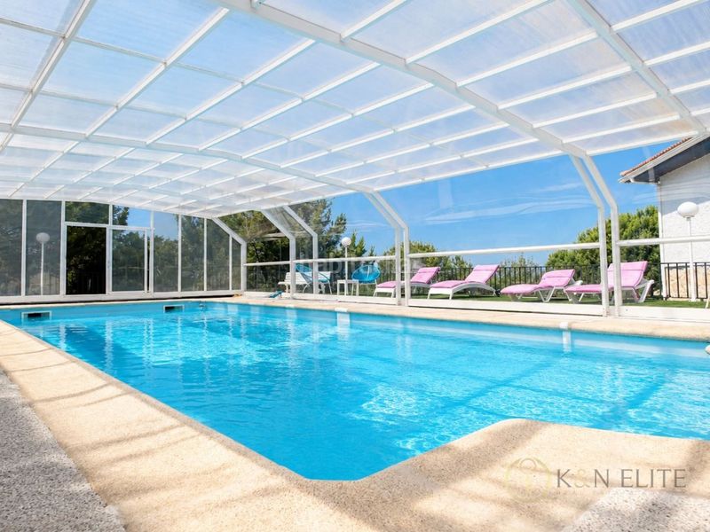Foto 56bb3385-ede3-4143-bfe9-7bdb0ac35d7f. Location chalet avec parking piscine dans Fontenebro-Altavista Collado Villalba