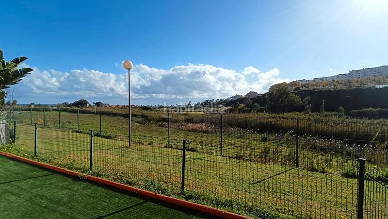 Foto e34b1eb7-1737-474c-9499-eee93a115200. Piso encantador bajo de 2 dormitorios con jardín privado en la duquesa en Manilva