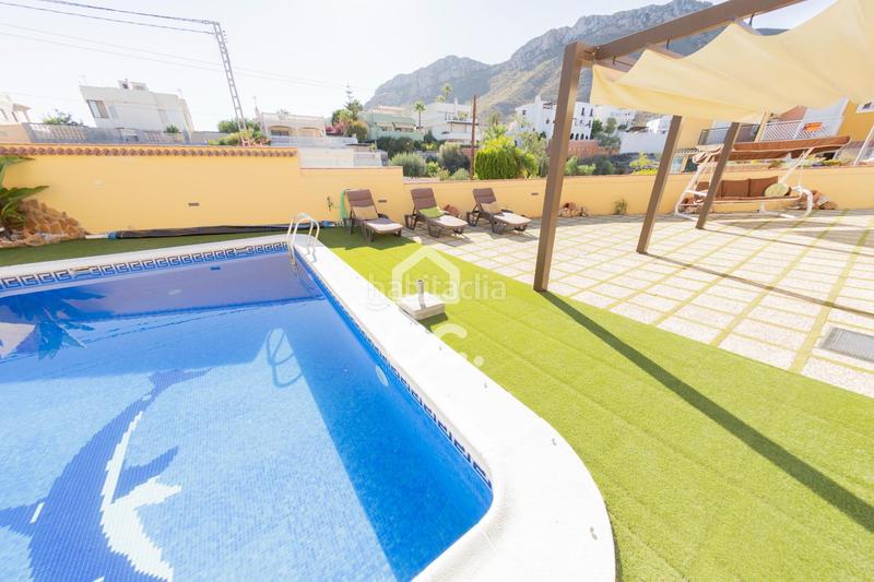 Foto 4416f841-807d-4b1e-bbe2-ada0ced583ed. Maison jumelée dans calle de río de janeiro 38 dans Águilas