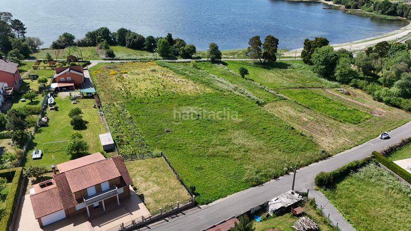 Foto f962884c-f125-4a61-874d-4ddba65ff6ee. Terreny residencial a Boiro