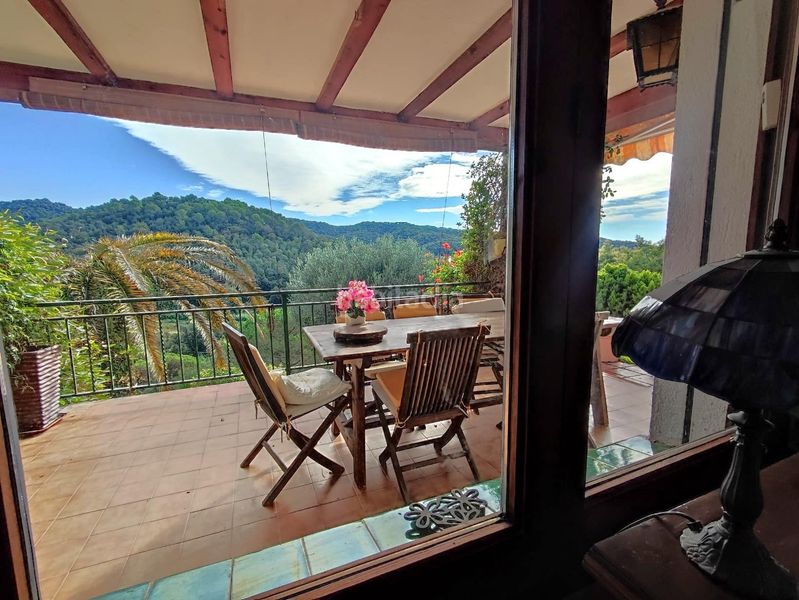 Foto ec11ecf2-b5f0-4a77-a720-056c27424303. Casa amb aparcament a Sant Cebrià de Vallalta