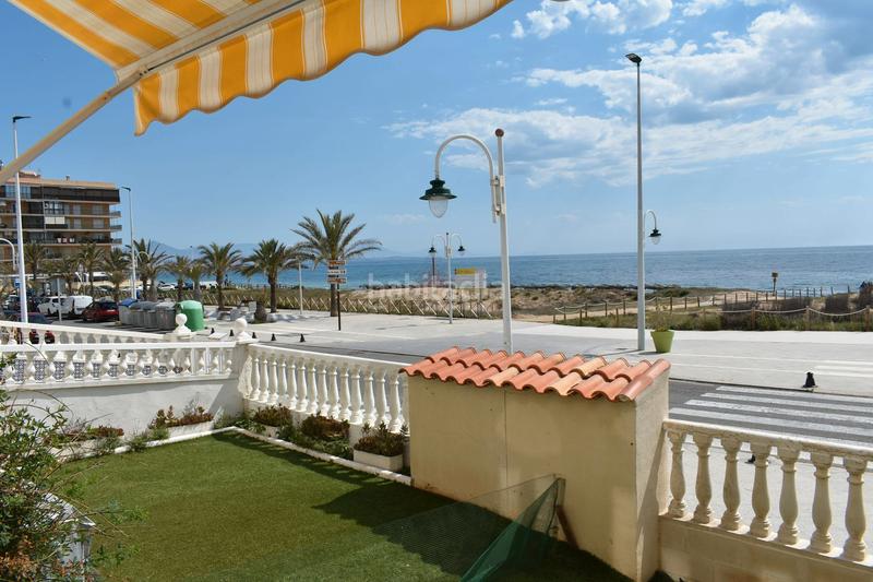 Foto 5d628ab8-c073-4015-bcf6-8cc217b0c6cf. Planta baja apartamento en planta baja en primera línea de playa en Elche / Elx