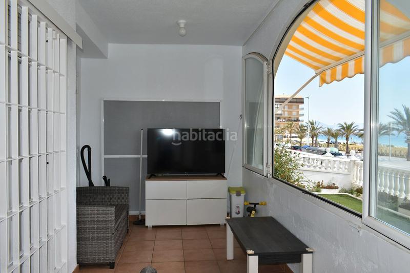 Foto e7f3c634-311a-4a2c-95b6-1faf4e4c7702. Planta baja apartamento en planta baja en primera línea de playa en Elche / Elx