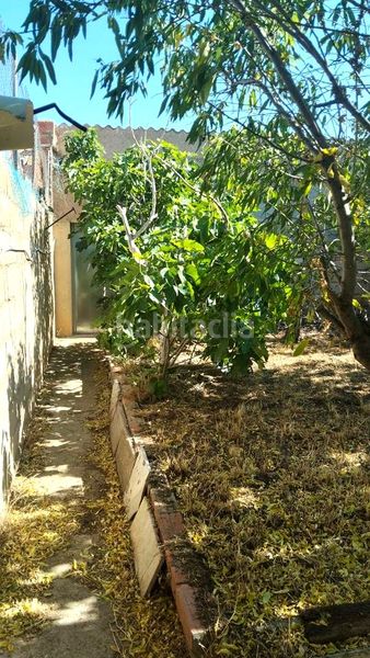 Foto 1354f5fc-e1a0-4135-9a7c-431c95648698. Casa adossada amb calefacció a Torrelacárcel