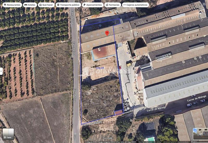 Foto 0c794ec6-c18a-4725-8a27-fecec42d45ec. Terrain industriel dans Moncada