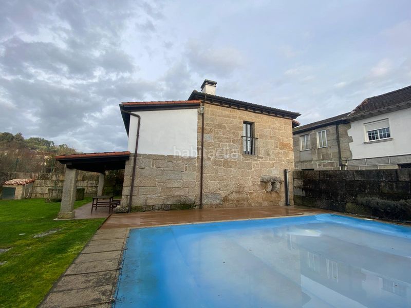 Foto 7a0088ac-9cdf-4cca-aa01-d9b6fa197f47. Xalet amb xemeneia calefacció aparcament piscina a Leiro