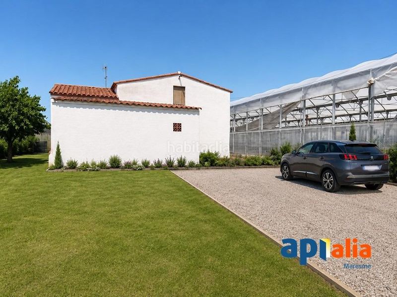 Foto 84e8b8a2-c690-4431-a02c-142e5ae8f006. Casa amb aparcament a Zona Industrial i Agrícola Vilassar de Mar