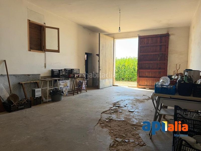 Foto a6dc1090-8c46-4f92-a6c6-a78a33e860e2. Casa amb aparcament a Zona Industrial i Agrícola Vilassar de Mar