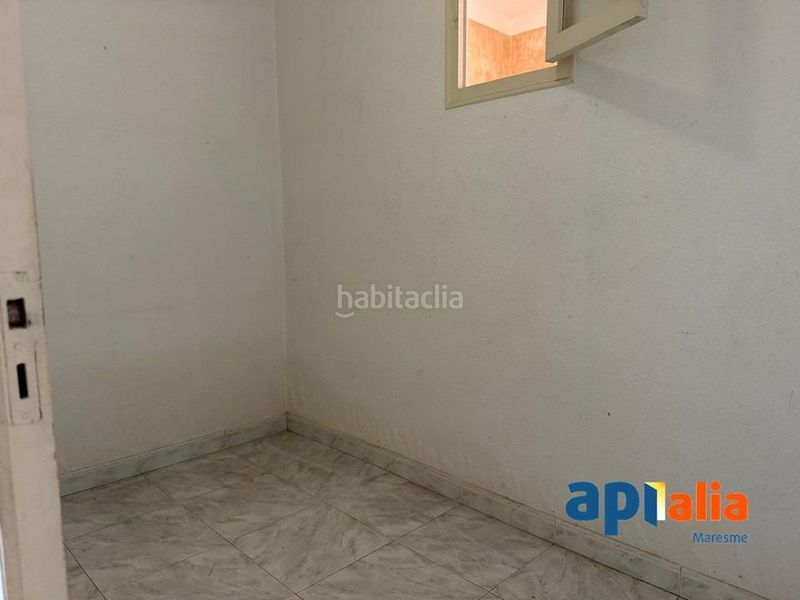 Foto d41320fe-4c57-46f2-a69a-3dd5cb36e1ee. Casa amb aparcament a Zona Industrial i Agrícola Vilassar de Mar