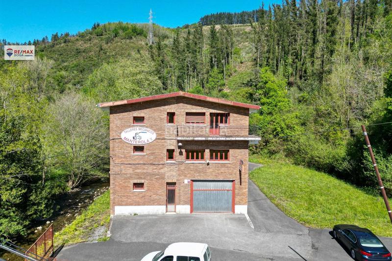Foto 5ebfb583-471f-423a-bba3-b88112abd313. Bâtiment à usage industriel dans Aia