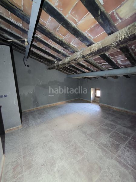 Foto a33658ba-6fc7-4b60-a253-8dbb0ca40d54. Casa adossada a Castelldans